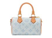 Louis Vuitton Nano Speedy Bleu Courrier Monogram Origine M28323 en toile bleu clair à motif Monogram, détails dorés et double poignée.