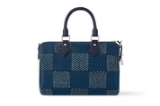 Louis Vuitton Speedy 25 Bandoulière Damier Heritage Blue, sac Louis Vuitton bleu avec motif Damier Heritage, poignées Toron et bandoulière ajustable.