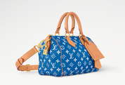 Louis Vuitton Speedy P9 Bandoulière 25 Monogram Leather Blue, sac Louis Vuitton bleu en cuir Monogram souple avec poignées Toron et bandoulière ajustable.