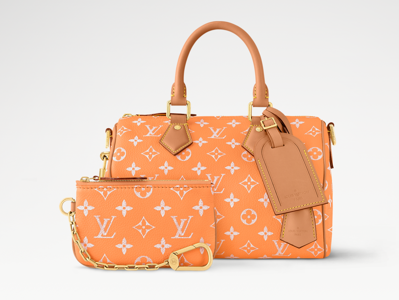 Louis Vuitton Speedy P9 Bandoulière 25 Summer Peach, sac Louis Vuitton en cuir souple coloris pêche avec motif Monogram et bandoulière ajustable.