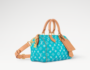 Louis Vuitton Speedy P9 Bandoulière 25 Turquoise, sac de luxe Louis Vuitton format 25 coloris turquoise avec bandoulière amovible et finitions haut de gamme.
