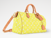 Louis Vuitton Speedy P9 Bandoulière 40 Lemonade Yellow, sac Louis Vuitton jaune en cuir souple Monogram avec poignées Toron et bandoulière ajustable.