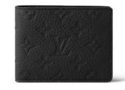 Louis Vuitton Wallet Multiple Taurillon Black en cuir Taurillon noir embossé Monogram avec format compact à deux volets.