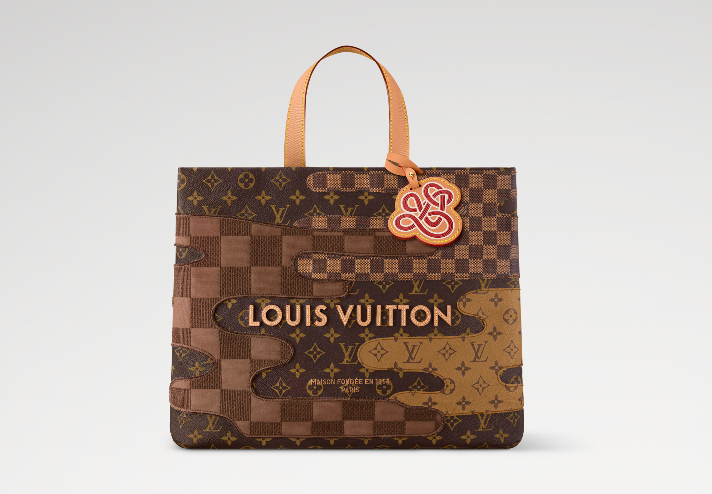 Louis Vuitton x Nigo Shopper Tote MM Brown, sac tote marron Louis Vuitton issu de la collaboration avec Nigo, au format MM et design streetwear premium.