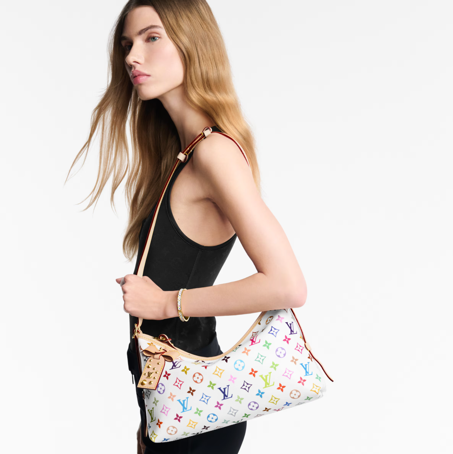 Louis Vuitton x Takashi Murakami CarryAll East West Multicolor White en toile Monogram Multicolore sur fond blanc avec longues poignées en cuir, pochette intérieure amovible et finitions métalliques dorées.