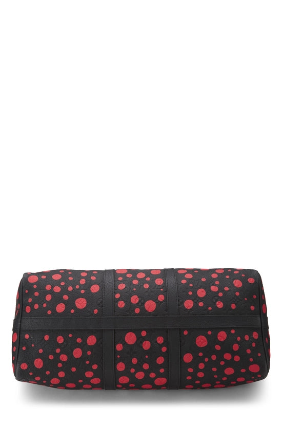 Louis Vuitton x Yayoi Kusama Keepall 50 Black/Red avec motifs signatures rouges de Yayoi Kusama sur fond noir, poignées roulées, bandoulière amovible, fermeture zippée et finitions métalliques.