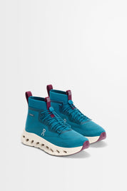 On Running Cloudtilt Hi LOEWE teal beige et bordeaux en mesh technique avec semelle CloudTec Phase premium. vue de 3/4