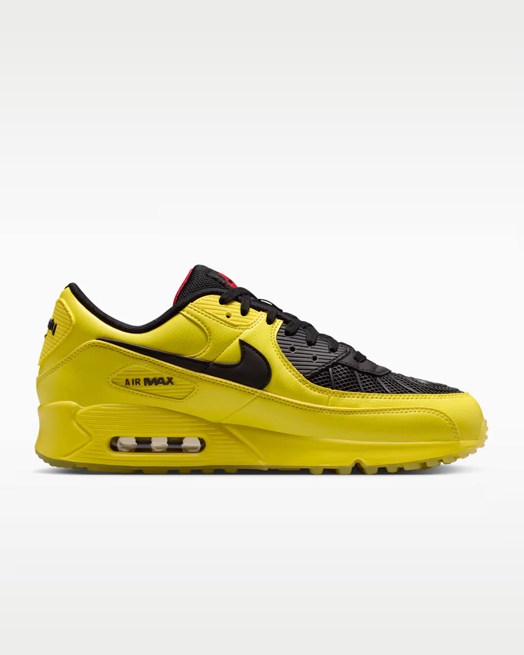 Sneaker Nike Air Max 90 Zest T90 Laser jaune en mesh technique avec semelle Air visible et détails inspirés de la Total 90.