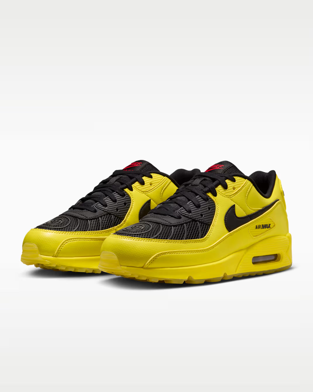 Sneaker Nike Air Max 90 Zest T90 Laser jaune en mesh technique avec semelle Air visible et détails inspirés de la Total 90.