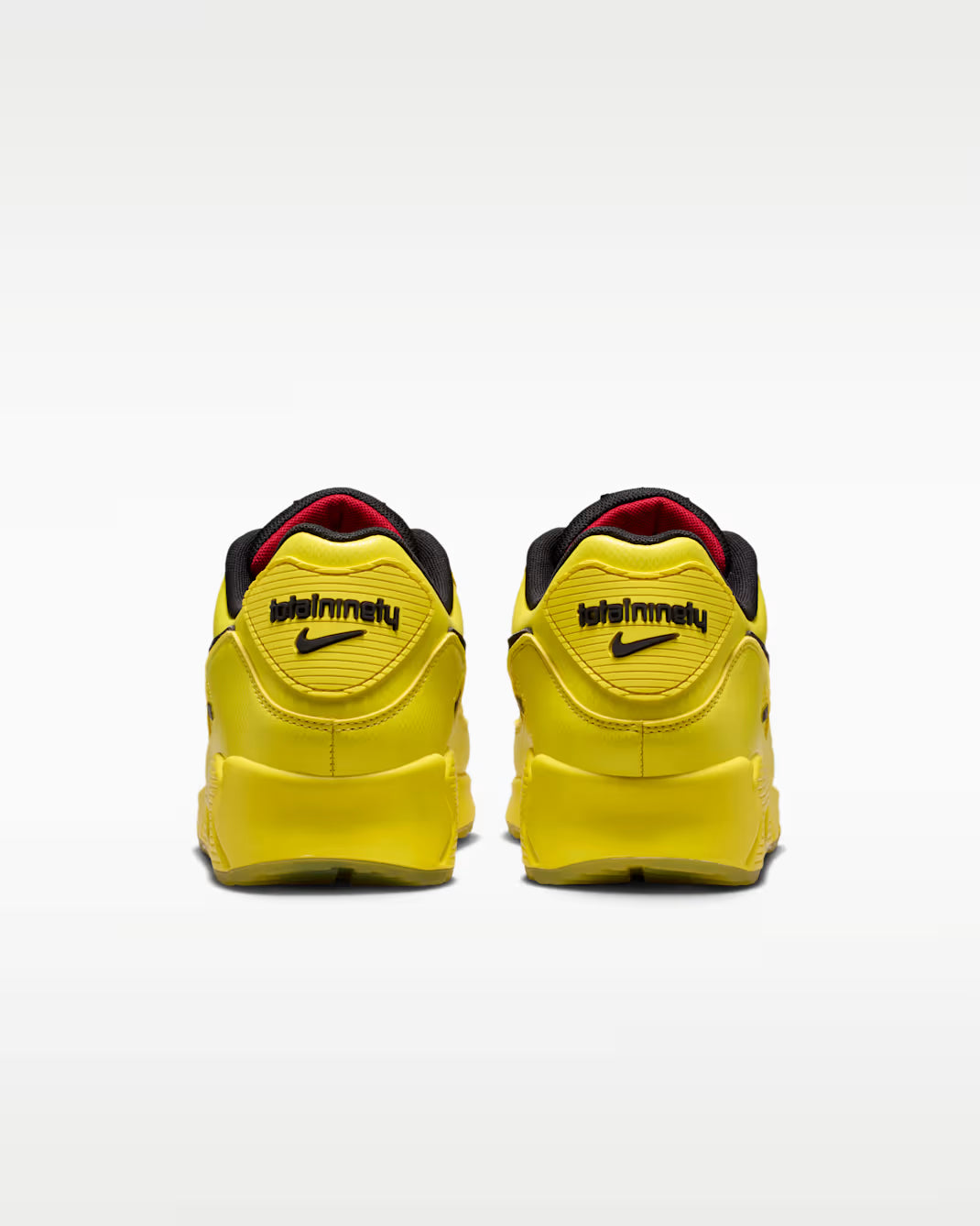 Sneaker Nike Air Max 90 Zest T90 Laser jaune en mesh technique avec semelle Air visible et détails inspirés de la Total 90.