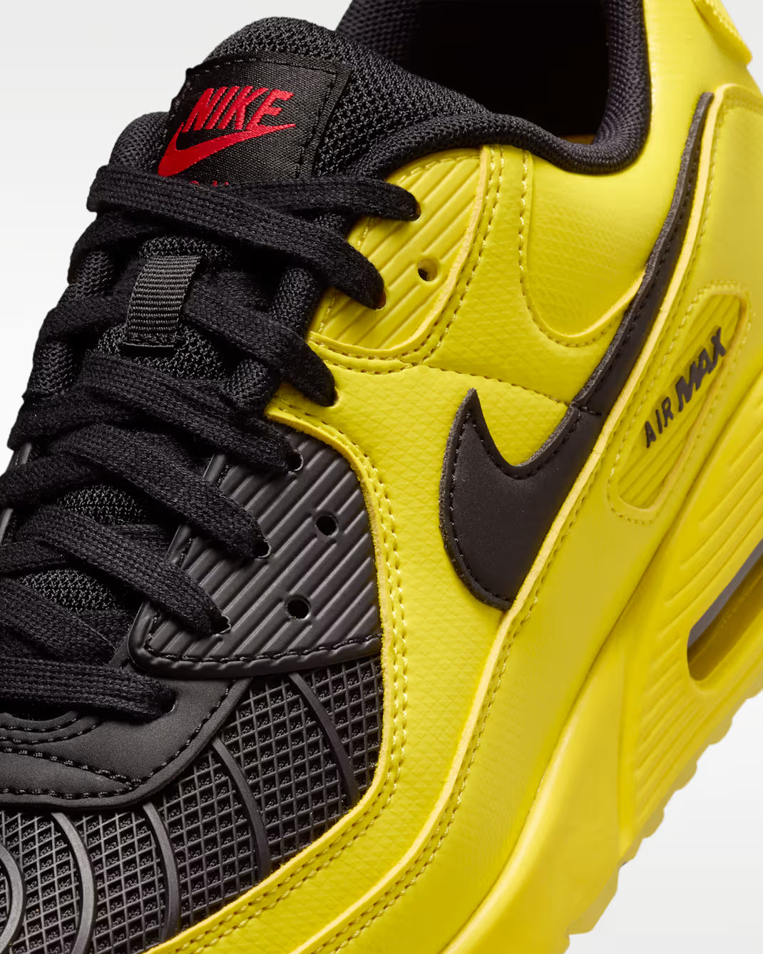 Sneaker Nike Air Max 90 Zest T90 Laser jaune en mesh technique avec semelle Air visible et détails inspirés de la Total 90.