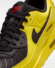 Sneaker Nike Air Max 90 Zest T90 Laser jaune en mesh technique avec semelle Air visible et détails inspirés de la Total 90.