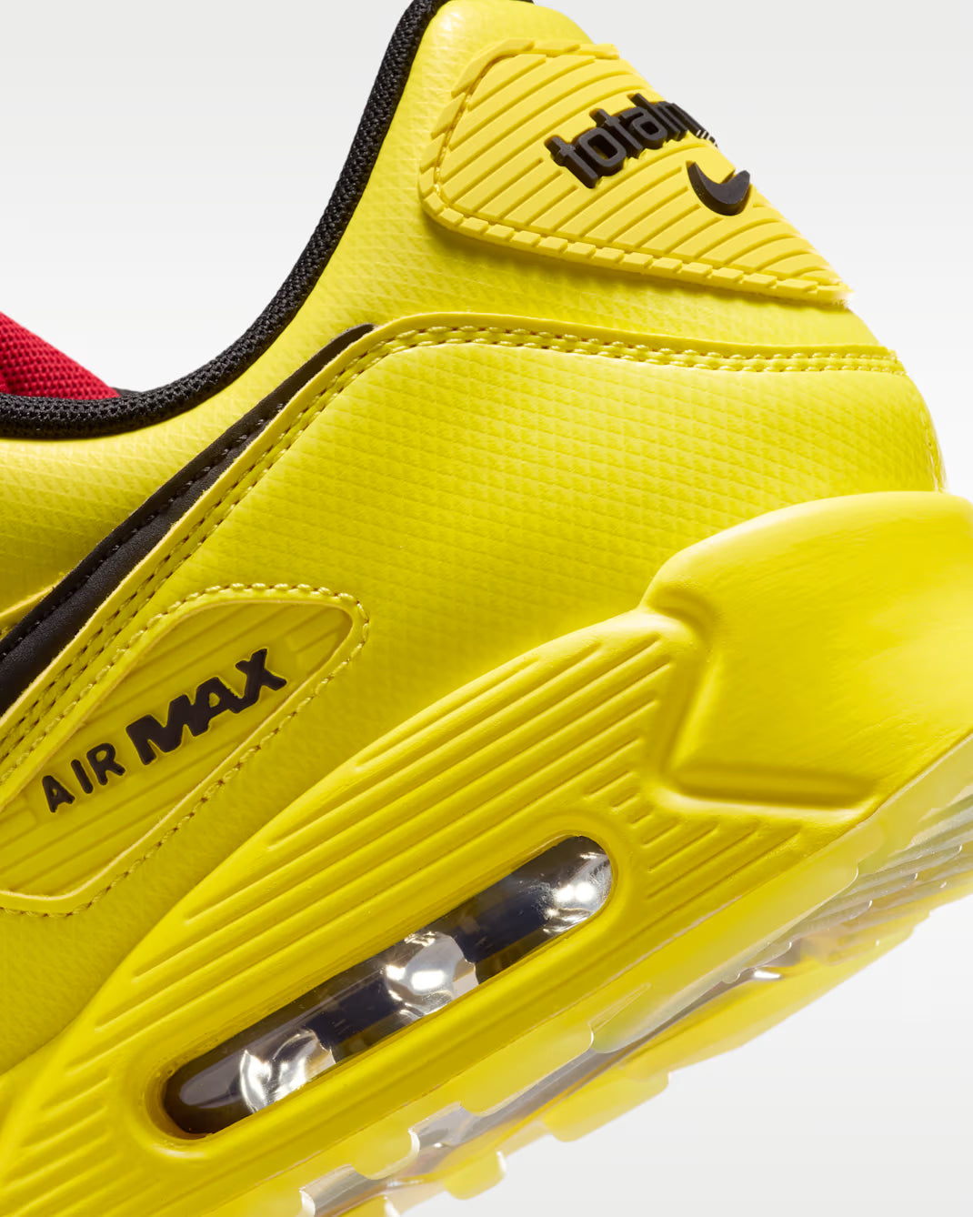 Sneaker Nike Air Max 90 Zest T90 Laser jaune en mesh technique avec semelle Air visible et détails inspirés de la Total 90.
