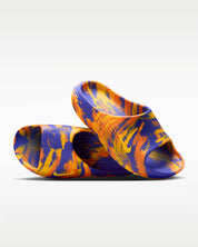 Nike ReactX Rejuven8 Slide SE bleue Lapis et orange Total Orange en mousse ReactX avec design ergonomique et confort premium. paires superposées