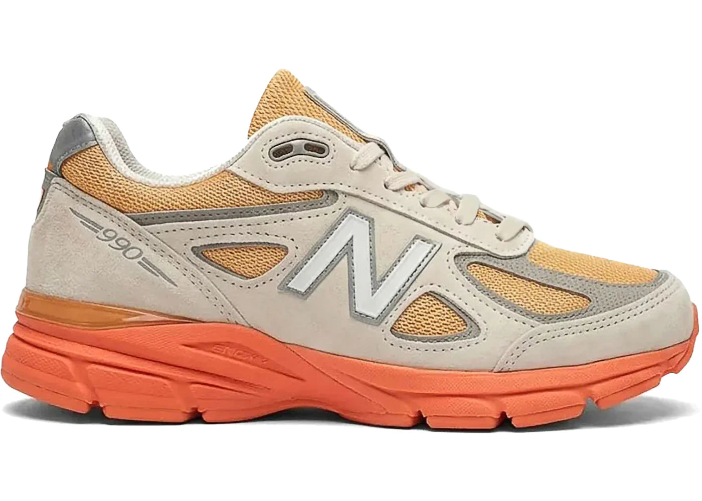xNew Balance 990v4 MiUSA crème Moonbeam et orange Tangerine Heat en suède premium avec semelle ENCAP et mesh respirant. vue de profil
