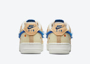 Sneaker basse Nike Air Force 1 Low en cuir blanc cassé, suède multicolore, détails graphiques exclusifs, édition 40e anniversaire LA Flea
