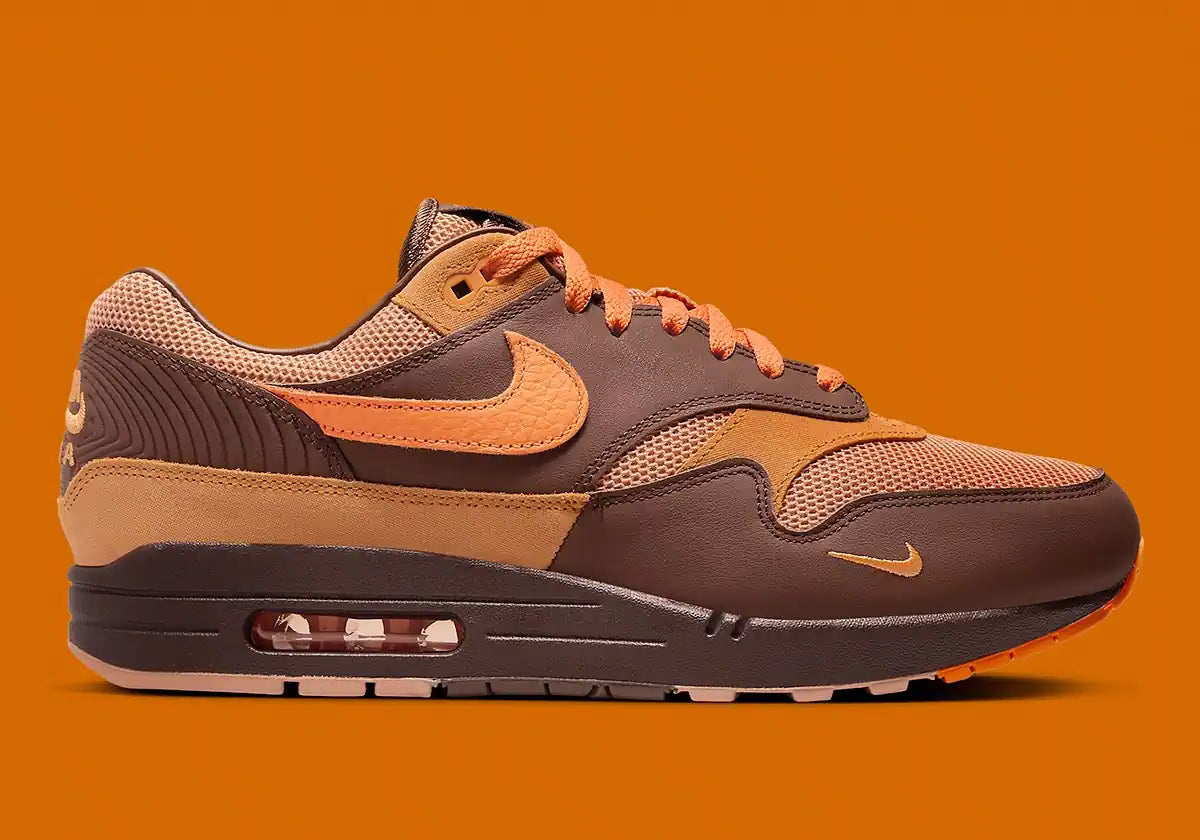 Chaussure de ville air max 1 marron et orange, semelle amortissante et confortable, vue de profil