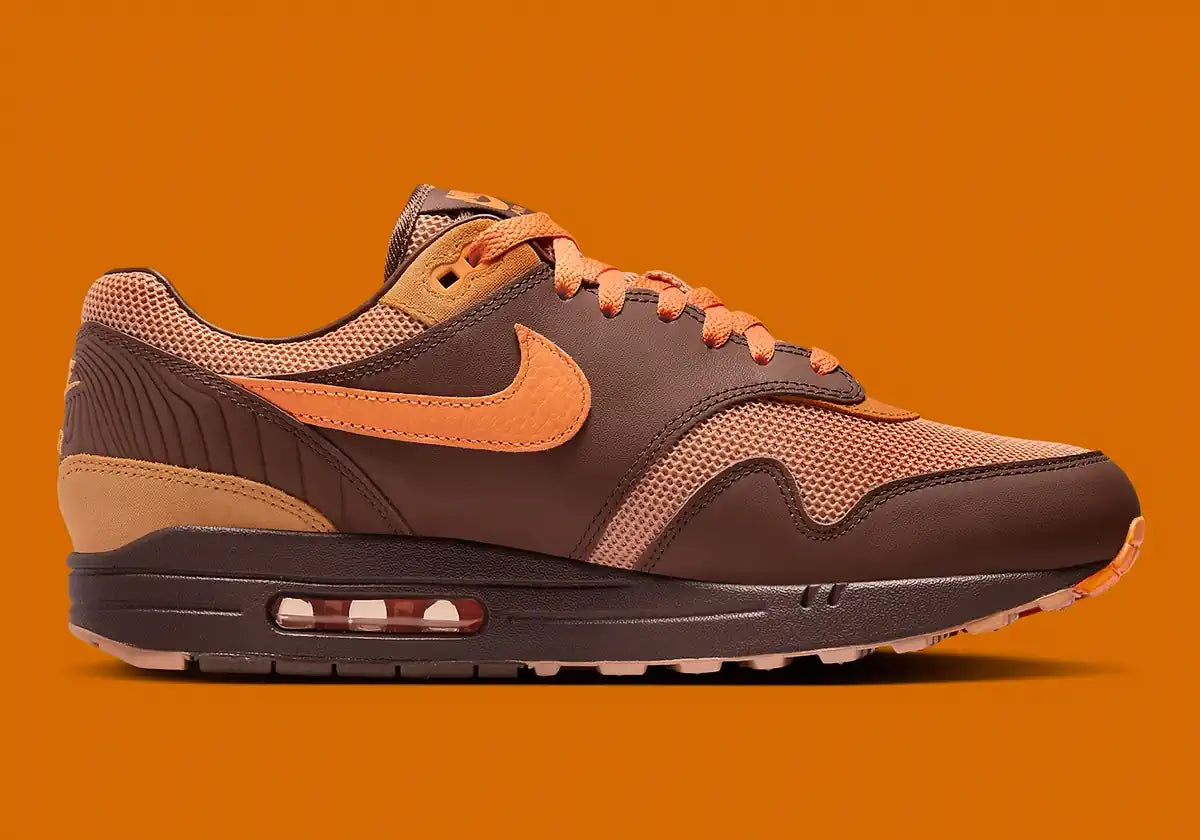 Chaussure de ville air max 1 marron et orange, semelle amortissante et confortable, vue de profil