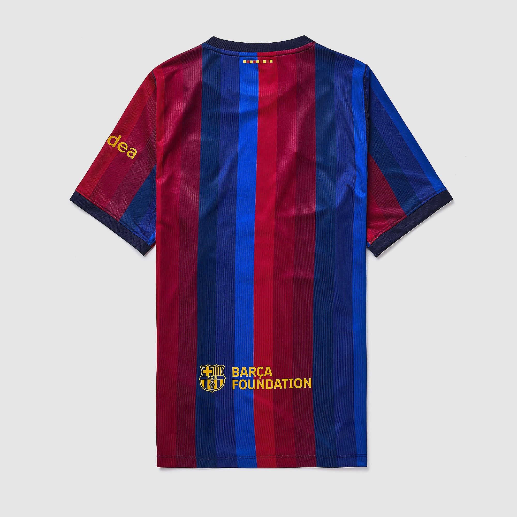 Nike FC Barcelona 2026/27 Stadium Home Dri-FIT Jersey, maillot domicile du Barça grenat et bleu avec détails Mineral Yellow.