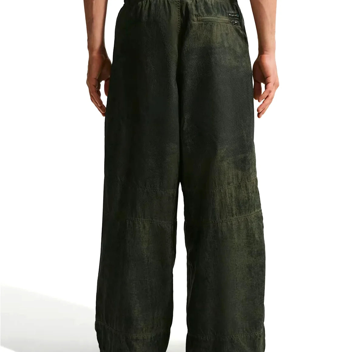 Nike ACG x CPFM Pant Multicolor, pantalon streetwear ample multicolore avec imprimé effet taches d’huile et détails techniques ACG.