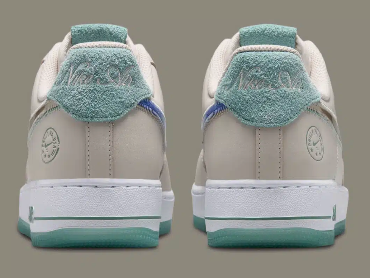 Nike Air Force 1 Low '07 Philadelphia avec tige en cuir premium, détails inspirés de Philadelphie, unité Nike Air encapsulée et semelle extérieure en caoutchouc à point de pivot.