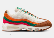Nike Air Max 95 OG Big Bubble 7-Eleven avec tige en mesh, cuir et daim, détails verts, rouges et orange, unités Max Air Big Bubble visibles et semelle extérieure en caoutchouc.