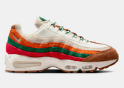 Nike Air Max 95 OG Big Bubble 7-Eleven avec tige en mesh, cuir et daim, détails verts, rouges et orange, unités Max Air Big Bubble visibles et semelle extérieure en caoutchouc.
