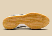 Nike Book 1 Python à silhouette basse, avec tige multicouche aux empiècements texturés effet serpent, amorti Zoom Air au talon et semelle extérieure adhérente.