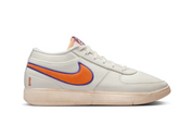 Nike Book 1 Valley à silhouette basse, avec tige textile multicouche aux tons inspirés de Phoenix, amorti Zoom Air et semelle extérieure en caoutchouc adhérente.
