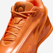 Sneaker Nike KD 19 Bright Ceramic orange vif avec tige en mesh technique, amorti Zoom Air et design performance basketball.