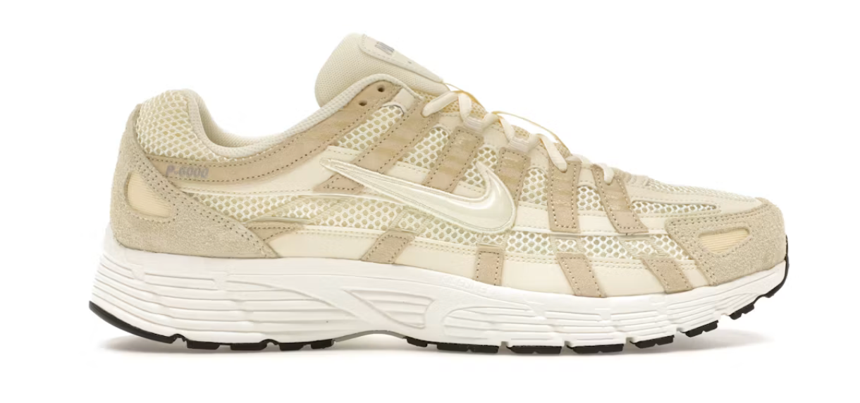 Nike P-6000 SE Alabaster Sail beige et crème avec tige respirante, empiècements multicouches, détails noirs et semelle rétro-running.