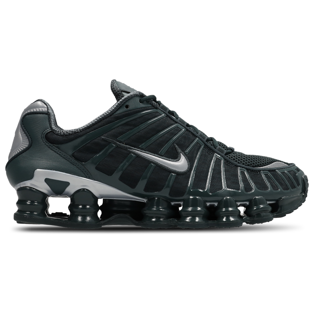 Nike Shox TL Seaweed Gunmetal avec tige en mesh respirant, renforts synthétiques Seaweed et Gunmetal et semelle Nike Shox intégrale offrant amorti et stabilité vue de profil. 