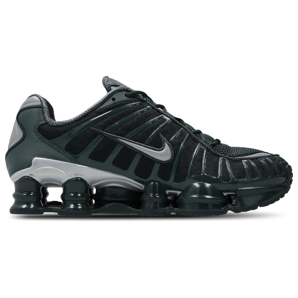 Nike Shox TL Seaweed Gunmetal avec tige en mesh respirant, renforts synthétiques Seaweed et Gunmetal et semelle Nike Shox intégrale offrant amorti et stabilité vue de profil intérieur. 