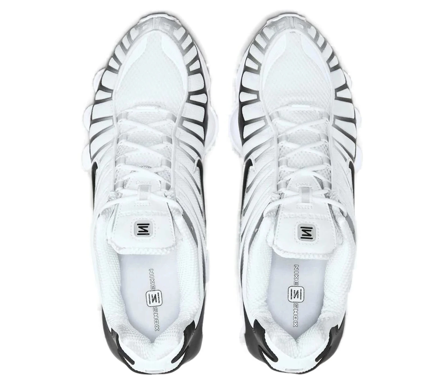 Nike Shox TL White Platinum avec tige en mesh respirant blanc, renforts synthétiques Platinum et semelle Nike Shox intégrale offrant amorti et stabilité vue du dessus. 