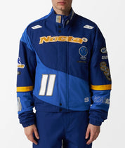 Nike x NOCTA L’Art Racing Jacket Deep Royal Blue Racer Blue Phantom – veste streetwear premium, vue porter par un mannequin