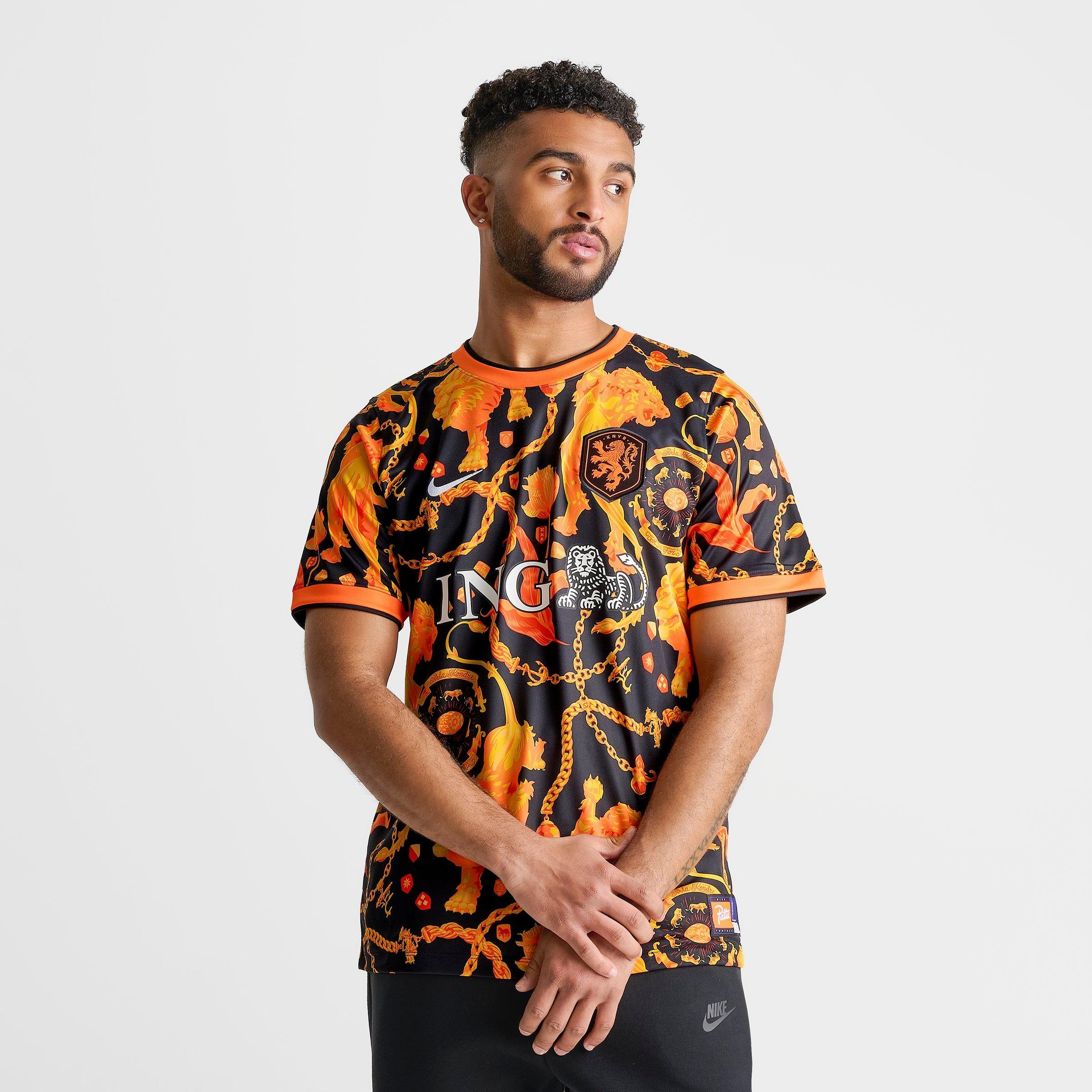 Orange en polyester technique noir et orange, doté de la technologie Nike Dri-FIT et d'un design inspiré du lion emblématique des Pays-Bas.