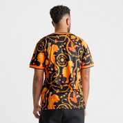 Nike x Patta Netherlands Academy Pro Lion Jersey Black/Orange en polyester technique noir et orange, doté de la technologie Nike Dri-FIT et d'un design inspiré du lion emblématique des Pays-Bas.