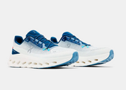 On Running Cloudtilt Ivory Tempest, sneaker On Running ivoire et gris avec technologie CloudTec Phase®, amorti performant et design minimaliste.