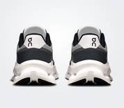 On Running Cloudtilt Remix Black Ivory, sneaker lifestyle On Running noire et ivoire équipée de la technologie CloudTec Phase® et de l'amorti Helion™.