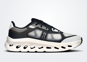 On Running Cloudtilt Remix Black Ivory, sneaker lifestyle On Running noire et ivoire équipée de la technologie CloudTec Phase® et de l'amorti Helion™.