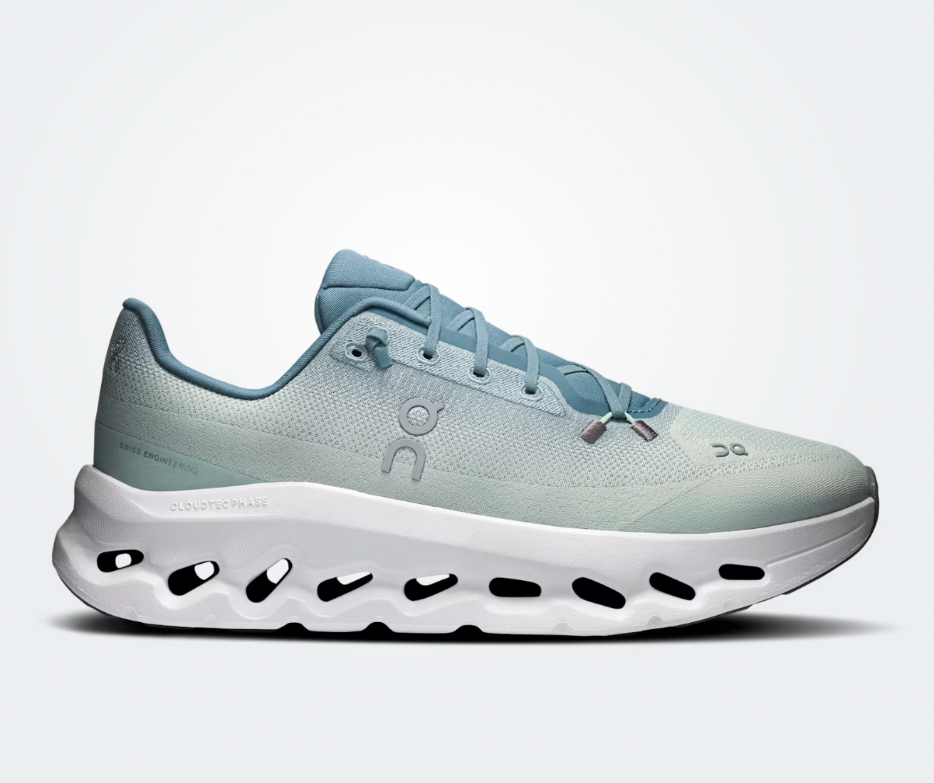 On Running Cloudtilt Tide Mineral, sneaker lifestyle bleue et grise équipée des technologies CloudTec Phase® et Helion™ offrant un amorti performant et un confort optimal.