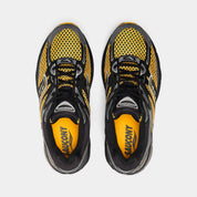 Saucony ProGrid Omni 9 Black Gold, sneaker running rétro noire et dorée en mesh avec empiècements techniques et semelle à technologie Grid vue du dessus. 