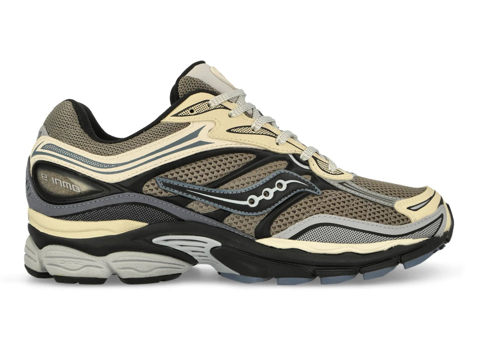 Saucony ProGrid Omni 9 Winter Tech Gravel Caviar en mesh technique renforcé avec détails minéraux et amorti ProGrid vue de profil. 