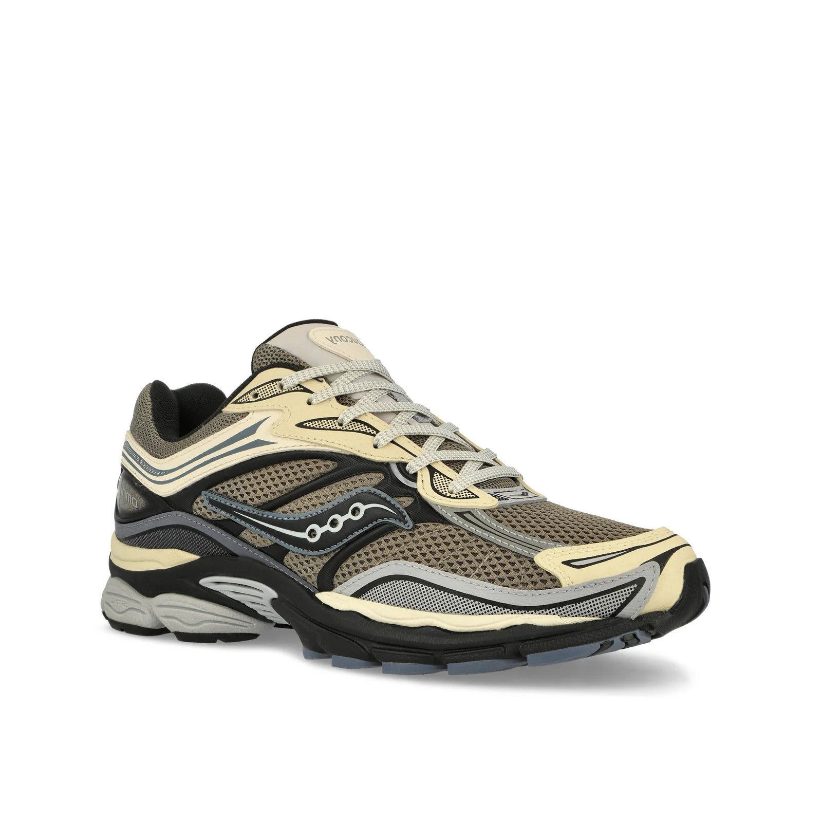 Saucony ProGrid Omni 9 Winter Tech Gravel Caviar en mesh technique renforcé avec détails minéraux et amorti ProGrid vue de 3/4 face. 