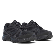 Saucony Grid Ride Millennium entièrement noire avec mesh texturé et semelle amortie GRID.Vue de profil
