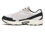 Sneakers Saucony Grid Ride Millennium blanches et noires en suède et textile avec technologie Grid et design running rétro.Vue de coté intérieur 