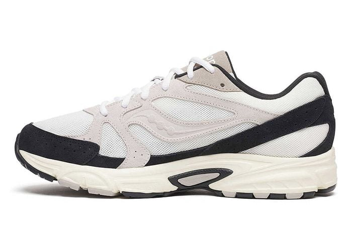 Sneakers Saucony Grid Ride Millennium blanches et noires en suède et textile avec technologie Grid et design running rétro.Vue de coté intérieur 