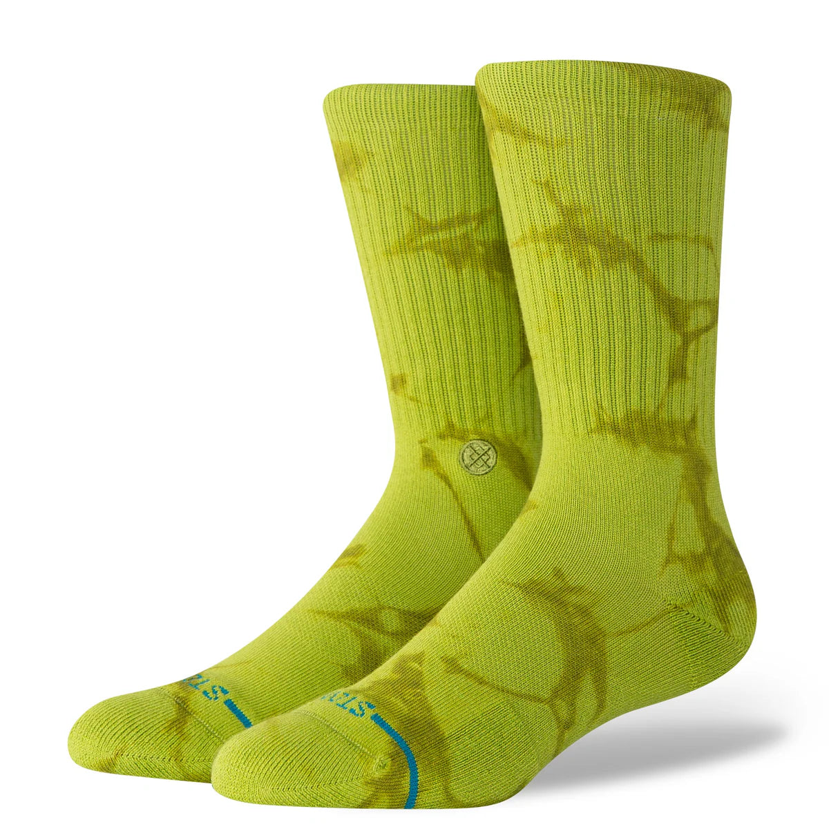 Paire de chaussette à motif tie and dye de couleur verte vue de 3/4 face