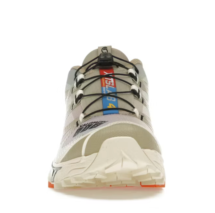 Sneaker Salomon XT-4 OG Aurora Borealis Shortbread en mesh technique avec renforts synthétiques, semelle Contagrip® et laçage Quicklace™.
