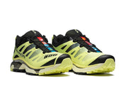 Image de la Salomon XT-4 OG Sunny Lime, sneaker vert citron et gris clair, tige en mesh technique, renforts TPU, semelle Contagrip, laçage Quicklace.